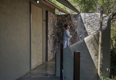 Safari camp offers guests both indoor and outdoor showers