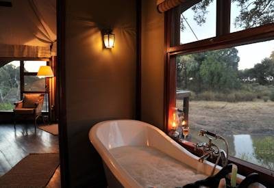 En-suite bathrooms with with views of the Kruger