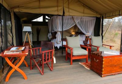 Tented suites overlooking a dry river bed