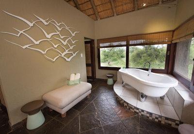 En-suite bathroom with bathtubs