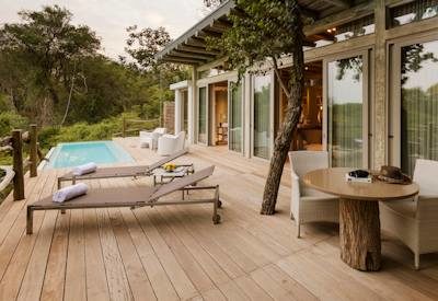 Private swimming pool with sun loungers