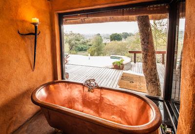 Bath tub and indoor and outdoor showers