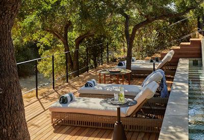 Main swimming pool area overlooking riverbed