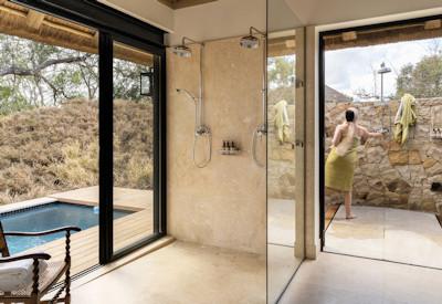Bathroom with private plunge pool and outdoor shower