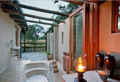 En-suite bathroom with lamps and candles