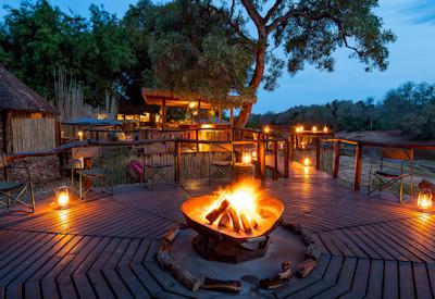 Sitting around a fire pit at night