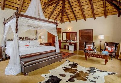 Thatched suites with en-suite bathrooms