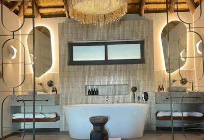 Double vanity and free standing bath tub