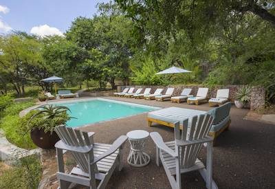 Small swimming pool with sun loungers