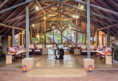 Thatched living areas at Game Lodge
