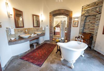 Large en-suite bathrooms fro baths and showers