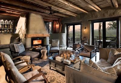 Thatched lounge area with fireplace