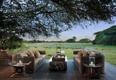 Wooden deck with sand forest views
