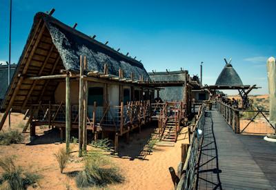 !Xaus and the thatched main lodge