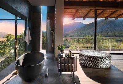 Stunning and private en-suite bathroom with separate tub