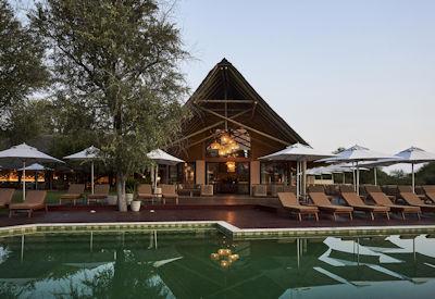 The main lodge at LETAMO with pool and sun loungers