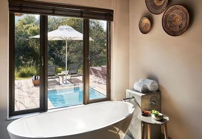 The room features a stunning en-suite bathrooms