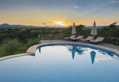 Large rim flow swimming pool