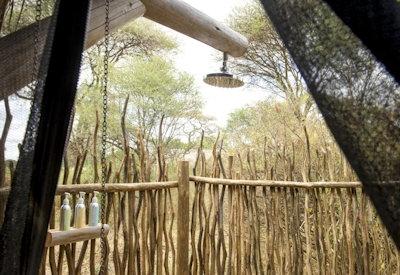 Private outdoor hot water bucket showers