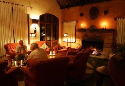 Moivaro lodge offers up a lounge with fireplace
