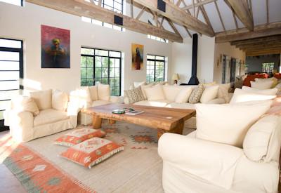 Hand woven carpets and vast overstuffed armchairs