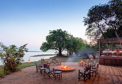Outdoor dining area with firepot at Chiawa