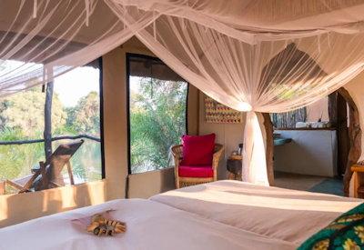 Large safari cottages at owner run lodge Kaingu