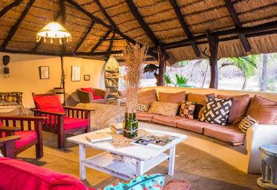 Lounge in the main lodge with thatched roofs