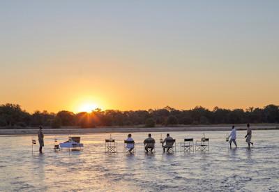 Sunset drinks in the Kapamba or Luangwa Rivers
