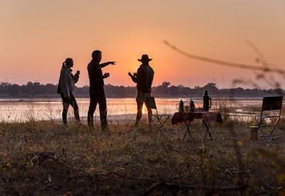 Classic sunset drinks on the banks of the Luangwa River