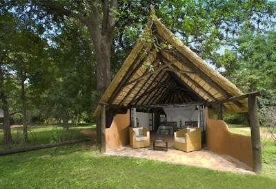 Nkwali Camp suites a short walk from the lounge