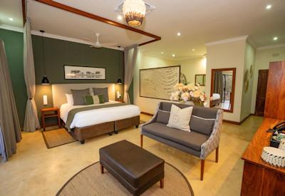 Spacious rooms with mosquito netting over beds