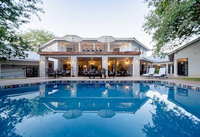 A Victoria Falls guest lodge with swimming pool
