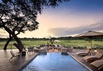 Swimming pool and firepit at Somalisa Acacia