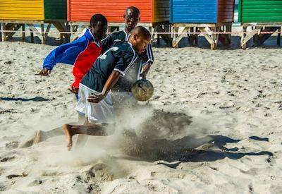 Beach games team building Africa sandcastles volleyball touch rugby treasure hunt corporate group fun