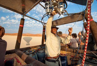 Hot air ballooning family Africa sunrise champagne breakfast South Africa Namibia Kenya Tanzania