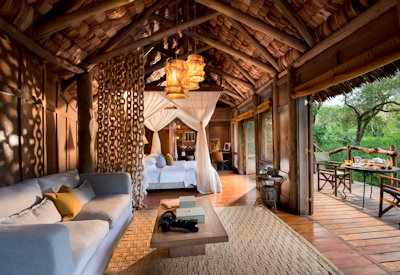 andBeyond Lake Manyara Tree Lodge banana leaf roof local timber natural colours Tanzania