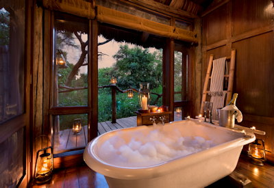 andBeyond Lake Manyara Tree Lodge private romantic freestanding bathtub treehouse Tanzania