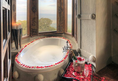 andBeyond Ngorongoro Crater Lodge chandelier-lit bathtub exclusive crater views Tanzania