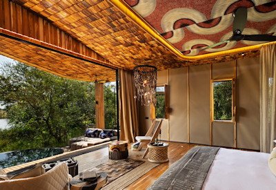andBeyond Grumeti River Lodge luxury suite plunge pool freestanding bath Serengeti Tanzania