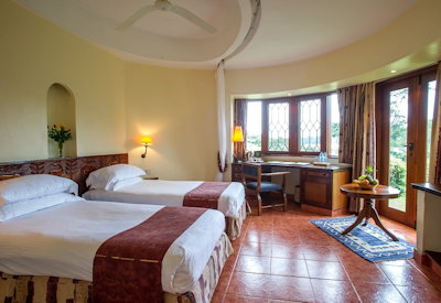 Arusha Serena Hotel twin bedded room air conditioning writing desk Lake Duluti Tanzania