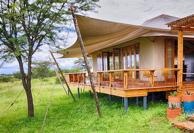 Sayari Camp main mess tent lounge library indoor outdoor dining northern Serengeti Tanzania
