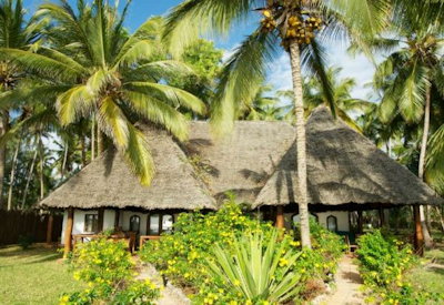 Bluebay Beach Resort tropical gardens white sand beach Indian Ocean Kiwengwa Zanzibar
