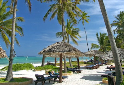 Breezes Beach Club sun tanning beach loungers Rising Sun PADI dive centre Zanzibar
