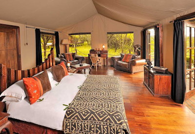 Serengeti Migration Camp tented suite private veranda sunset-facing Grumeti River Tanzania