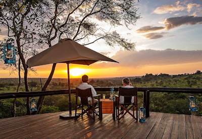 Serengeti Migration Camp wooden viewing deck Serengeti Plains wildlife birdlife Tanzania