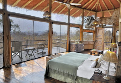 Tarangire Treetops Lodge large open-fronted suite private balcony elephant migration Tanzania