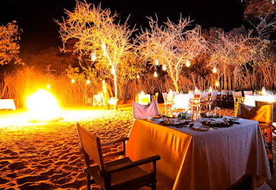 Tarangire Treetops Lodge open-air boma dinner four-course stars Maasai cultural Tanzania