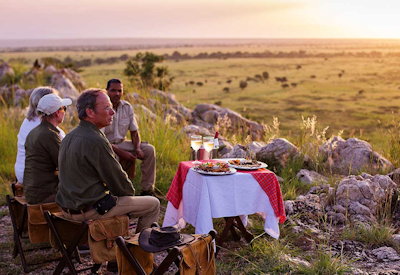 Tarangire Treetops Lodge sundowner drinks baobab-studded hills Tarangire National Park