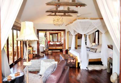 Escarpment Luxury Lodge luxury chalet four-poster bed private viewing deck Tanzania